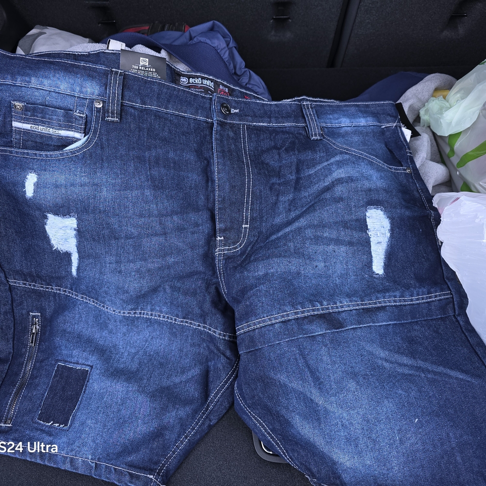 Ecko Unlimited Blue Jean Shorts with Distressed Design